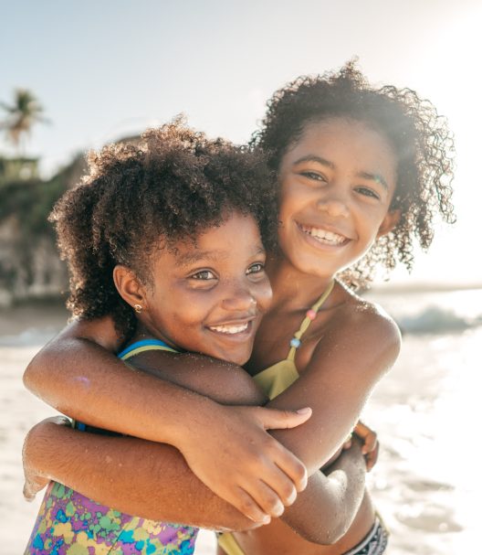 Happy girls on the beach
